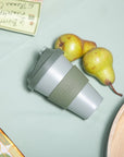 sage + olive | urbb | biodegradable bamboo coffee cup - porter green | style + sustainability