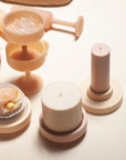 wheat + oat | escc medium pillar candle | soy - blend unscented candles - porter green | style + sustainability